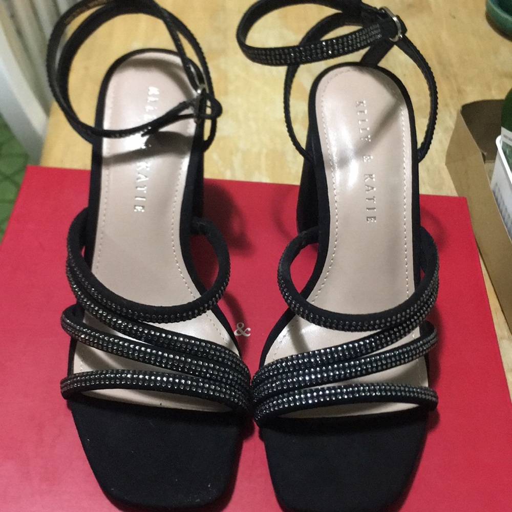 Brand new pair of black heels
